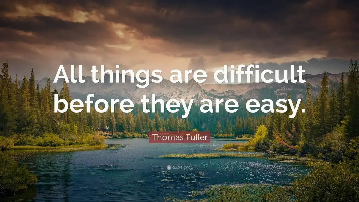 Quotefancy digital signage from Reach Media Network displaying inspirational quote from Thomas Fuller and mountain lake imagery.