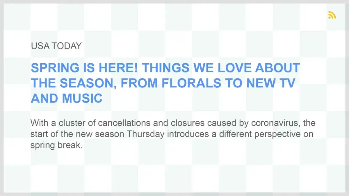 Digital signage screen from Reach Media Network displaying USA Today news headlines RSS feed.